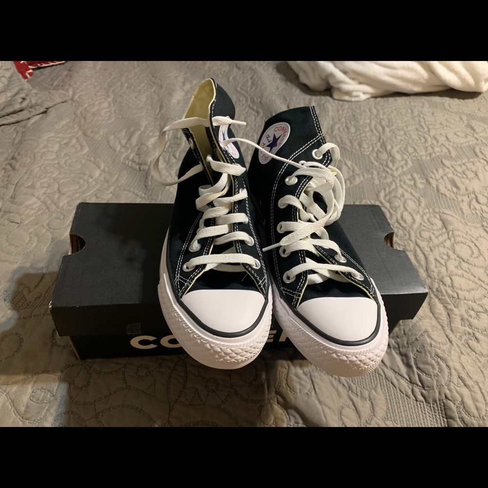 NIB Converse black hi tops.